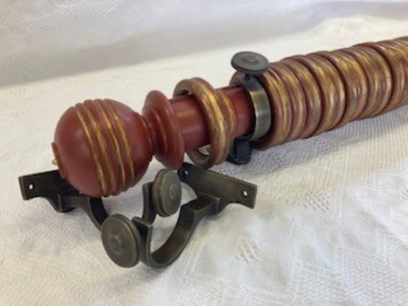 Painted Bamboo pole with finials, rings and brackets.