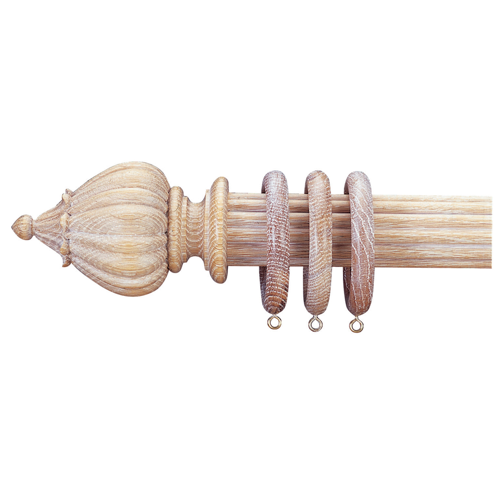 Jewel finial on reeded curtain pole