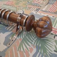 50mm dia. Light oak pole, carved oak finials, nickel rings and nickel brackets.