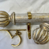 Gilt over White pole with finials and brackets.