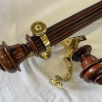 Tracked Reeded mahogany pole set with Olympia finials