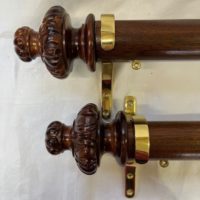 Tracked mahogany poles with brackets and finials