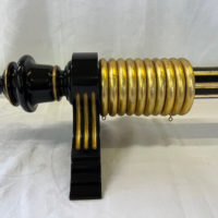 Black Lacquer and Gilt fluted pole set with fluted brackets and Dutch Metal Leaf rings