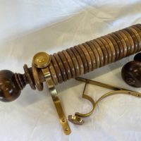 Simple Ball and Button finials set in Oak