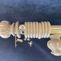Fluted pole with Lotus finials and rings