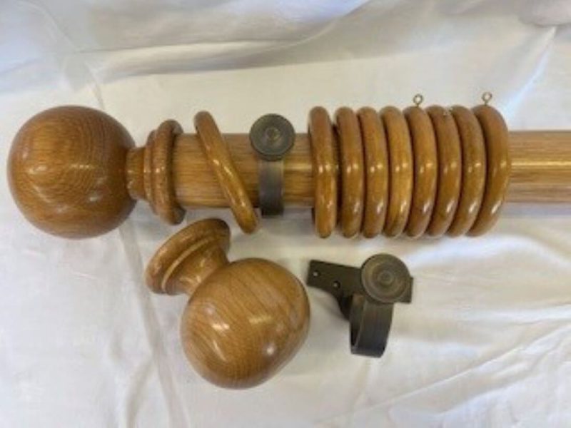 Natural Beech pole with finials, rings and brackets.