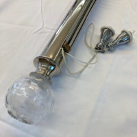Polished nickel tracked pole with Astor finials