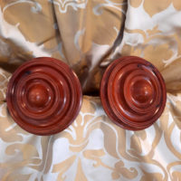 Roundel tiebacks