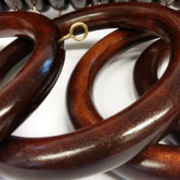 20 Hand turned and hand polished solid mahogany rings